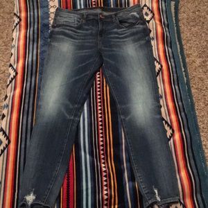 Buckle black ankle skinny jeans